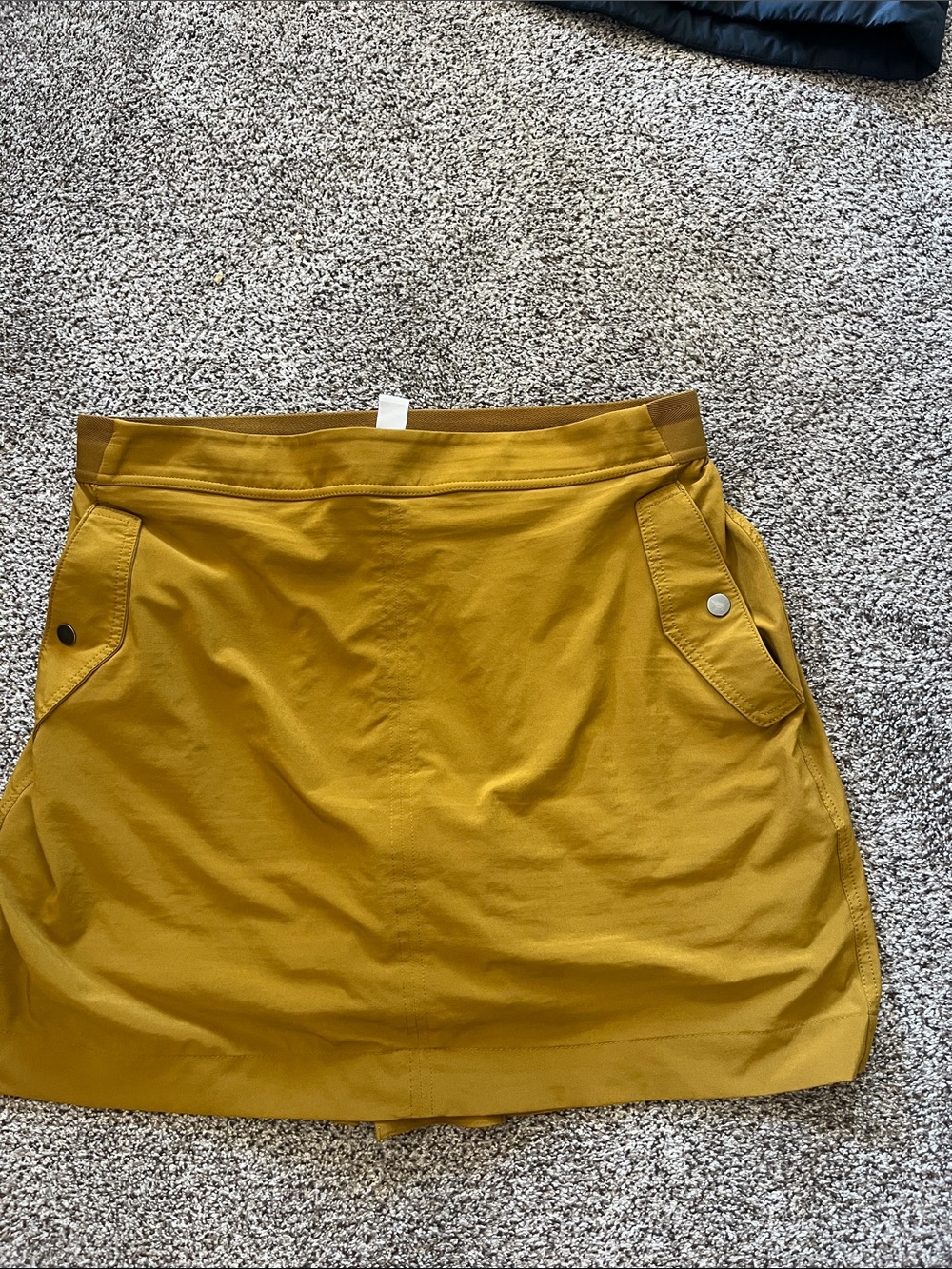 Athleta Mustard Mini Skirt with Snap Flap Pockets